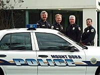 Left to Right: Capt. Ron Rauth, Chief Randall Scoggins,      Lt. Robert Newsome, and Lt. Roger Chilton